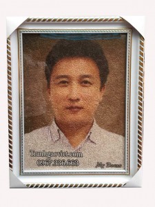 Quà tặng sếp tranh gạo chân dung